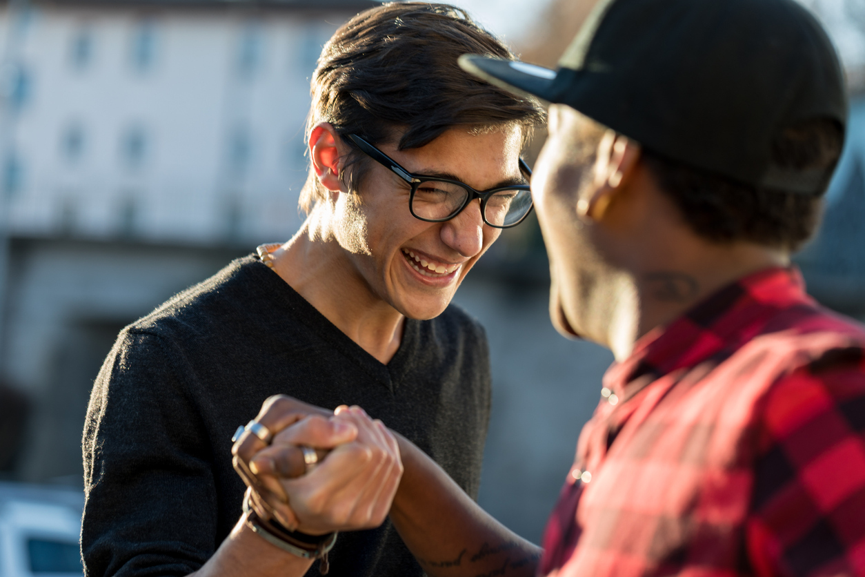 guy friends laughing together