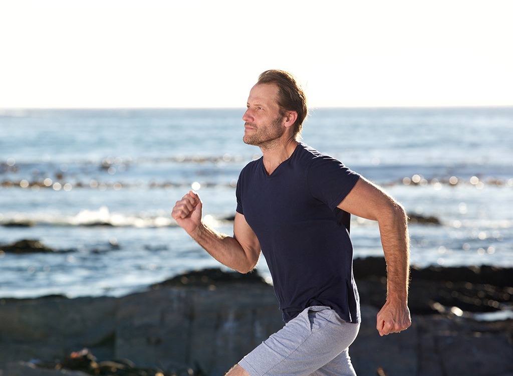 Middle aged man running