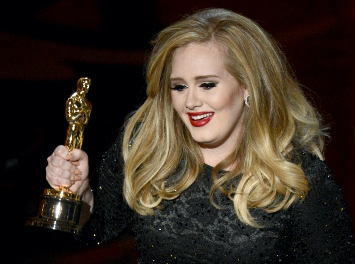 Adele accepting her Oscar in 2013