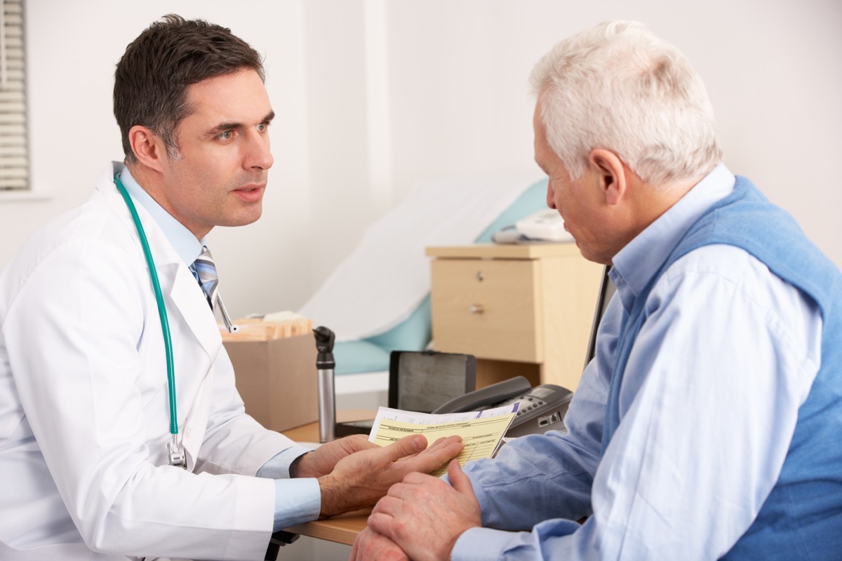 Doctor talking to older man