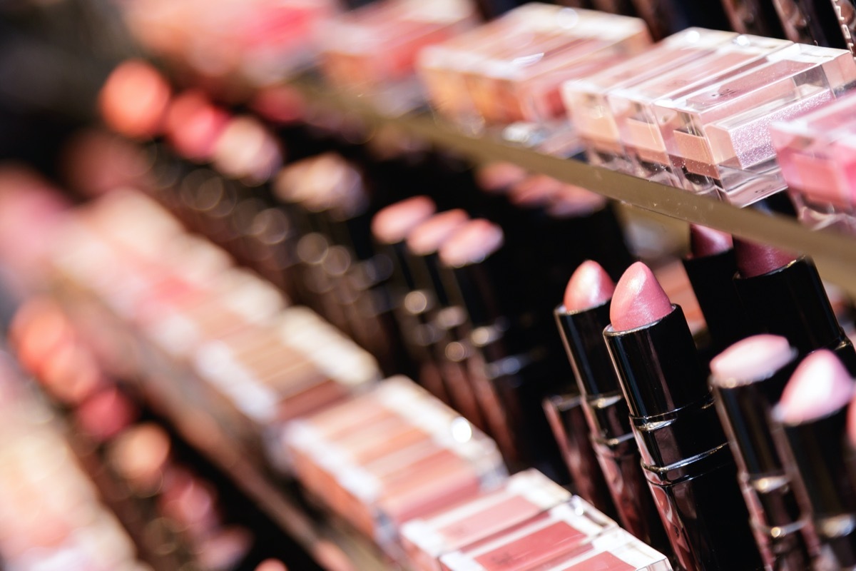 Testers of different lipsticks in the cosmetic store.