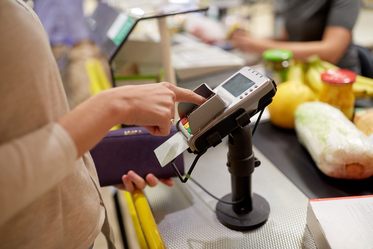 woman returning food at grocery store or supermarket