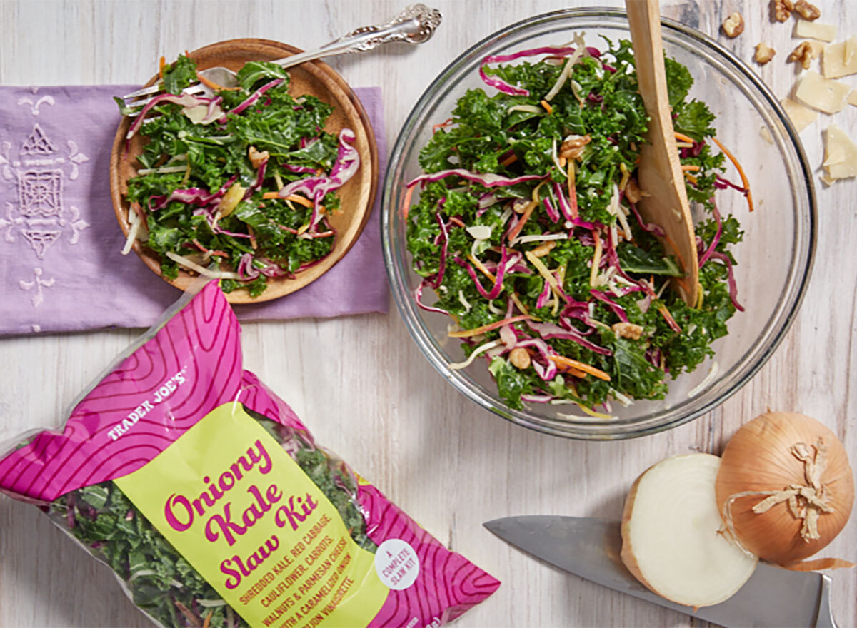 trader joes oniony kale slaw kit with bowl of salad