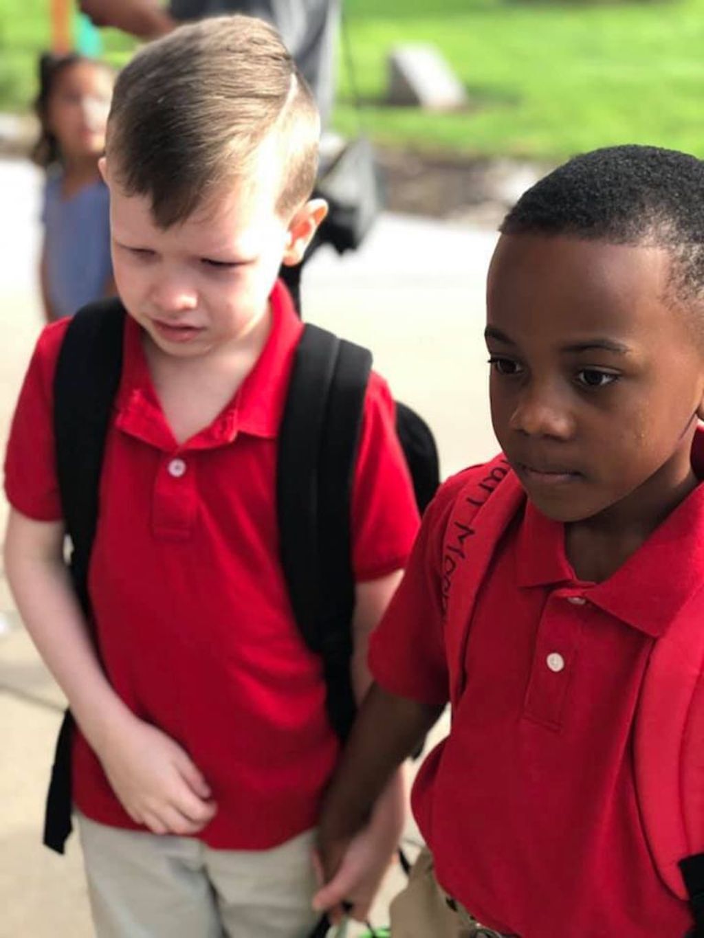 christian moore comforts connor crites on first day of school