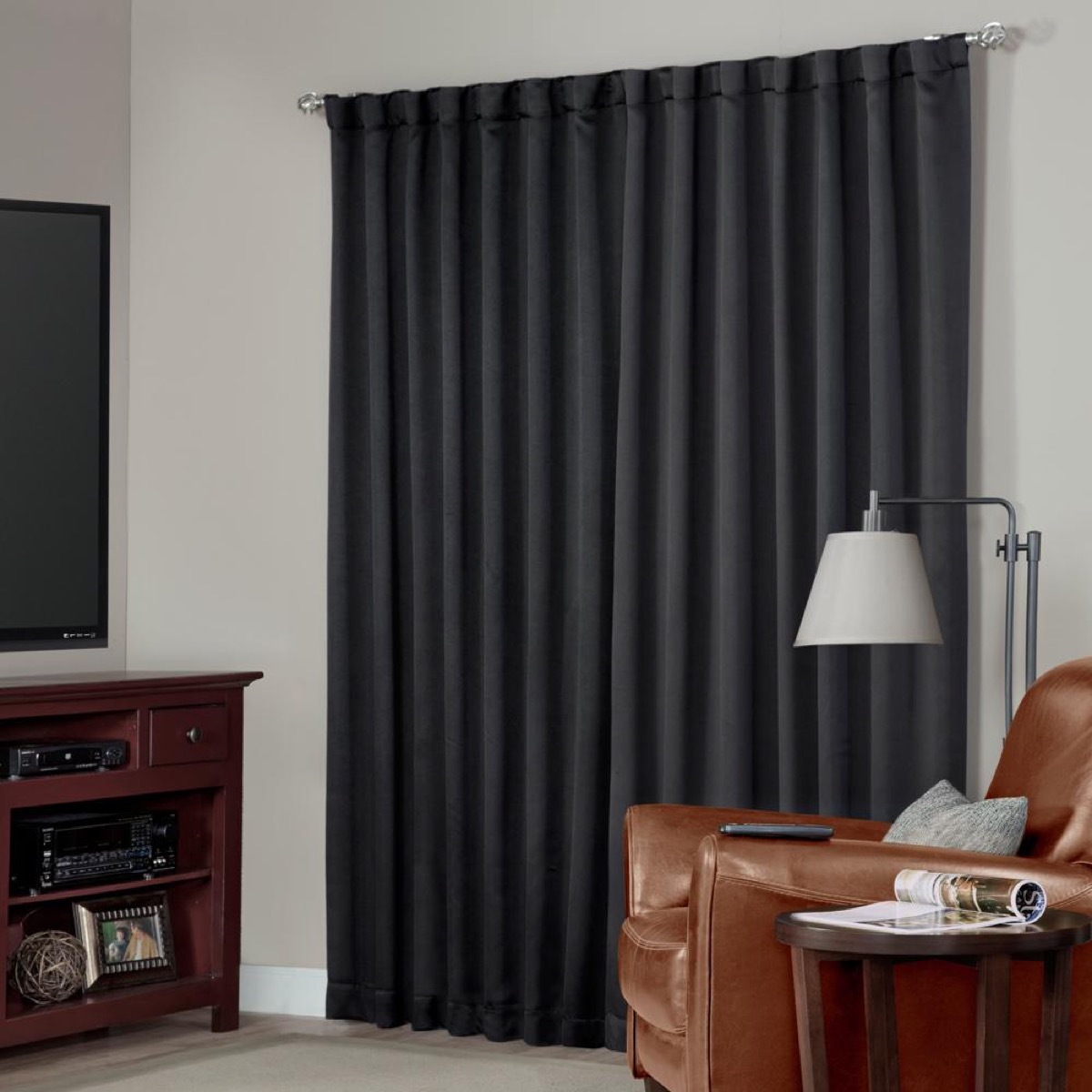 gray room with dark gray blackout curtains, better sleep essentials