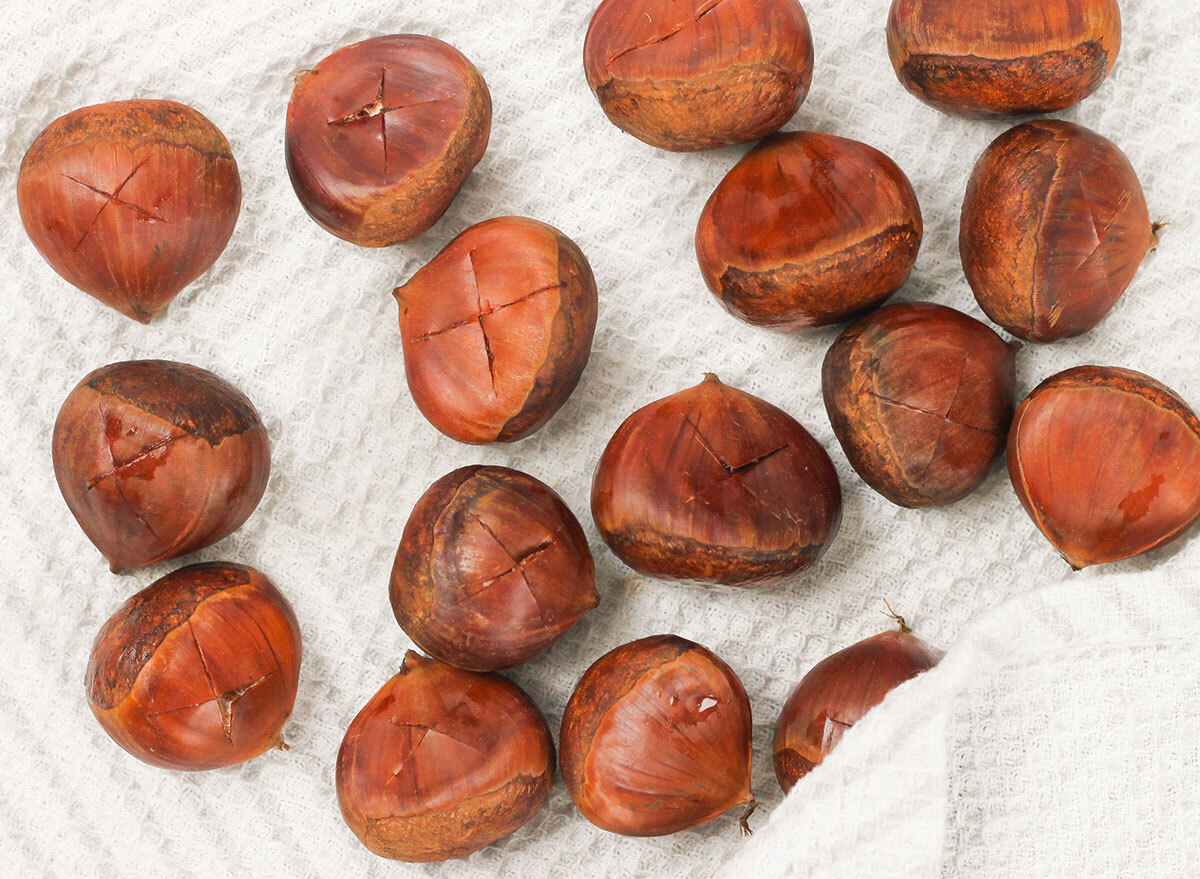 patting the chestnuts dry with a towel