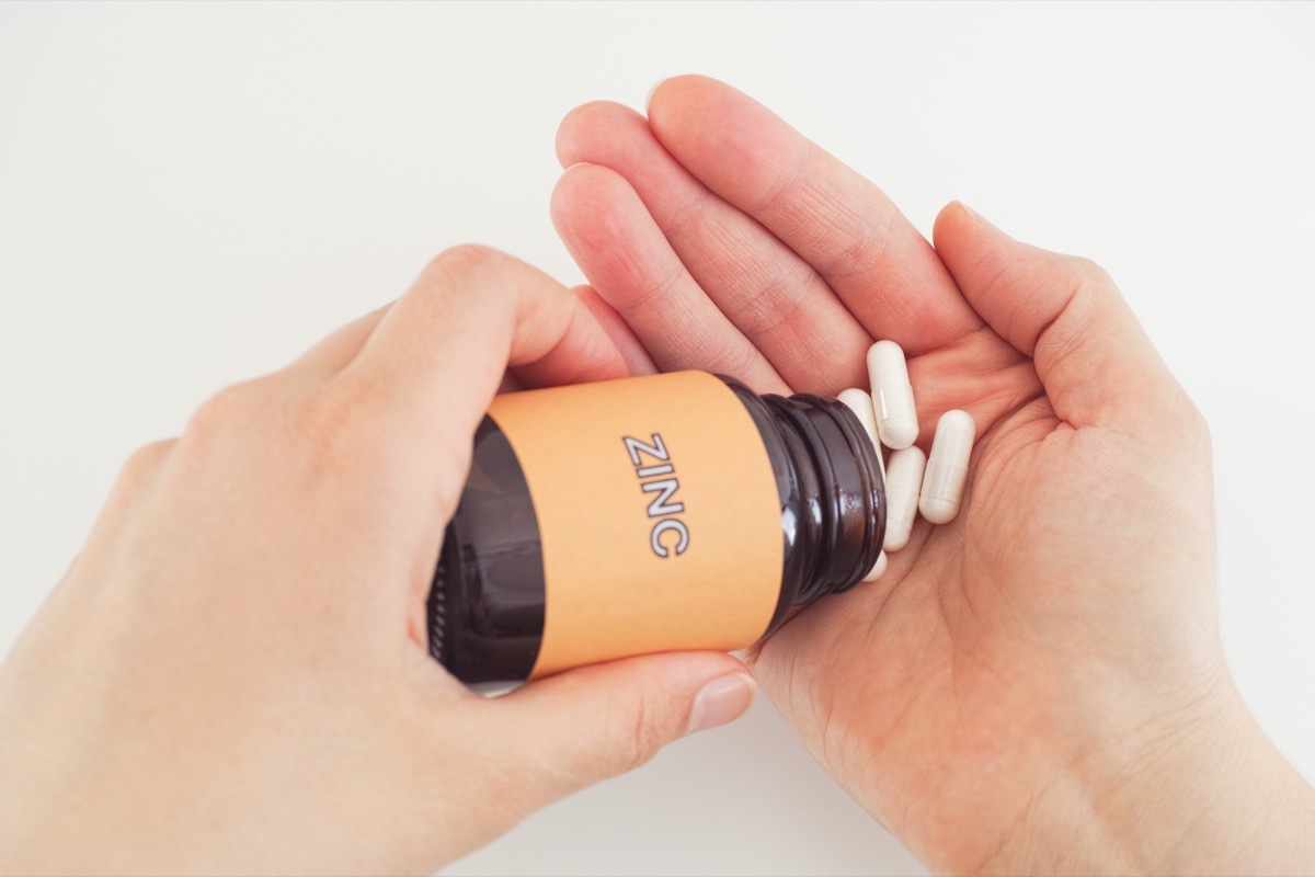 Zinc Pills Poured into a Hand