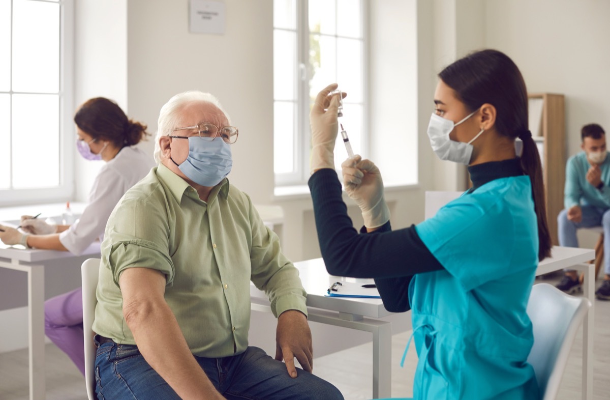 Older man getting COVID vaccine