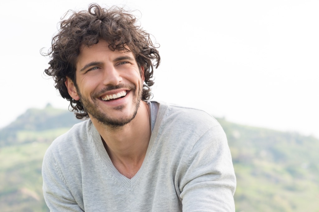 Smiling, happy young man