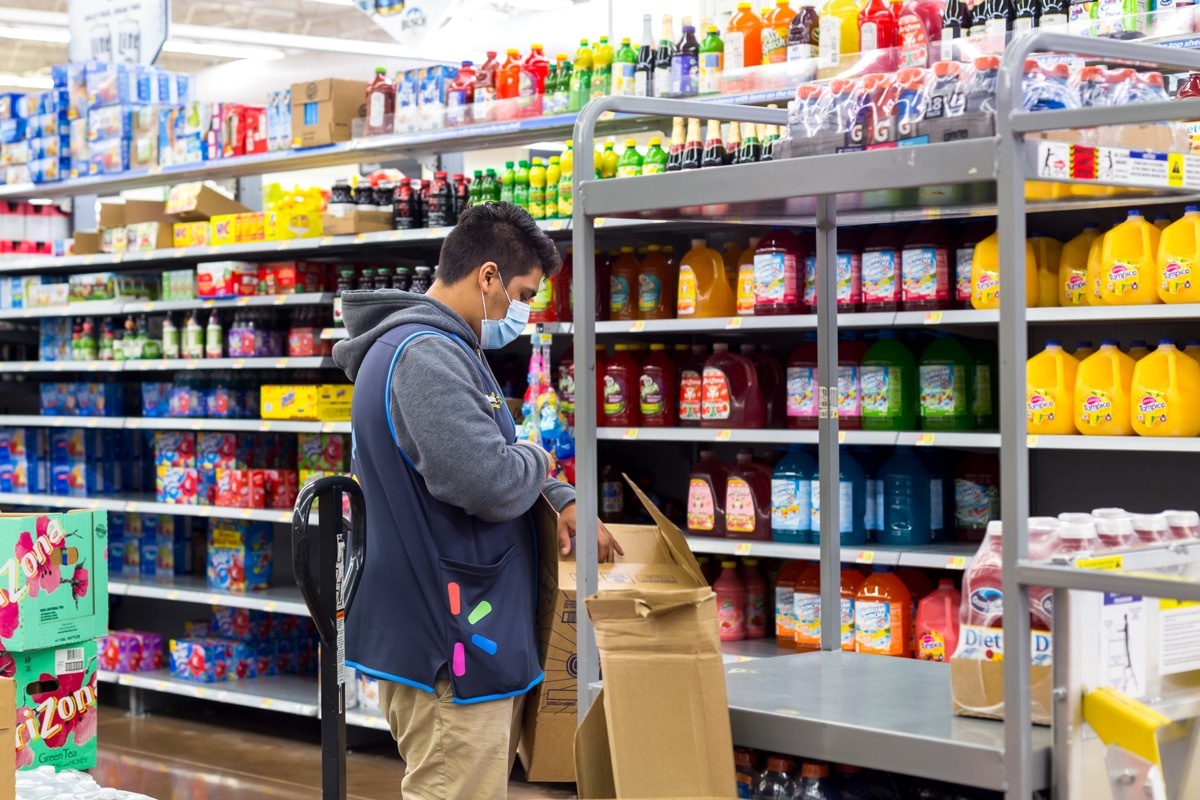 walmart worker unloading box