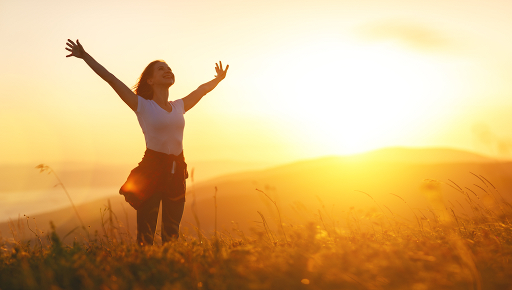 happy woman outside, ways to feel amazing