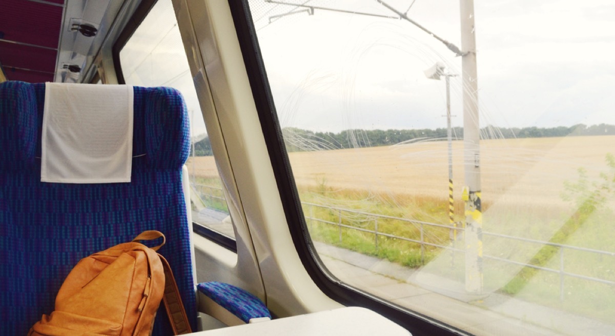 backpack on the seat of a commuter train, etiquette mistakes