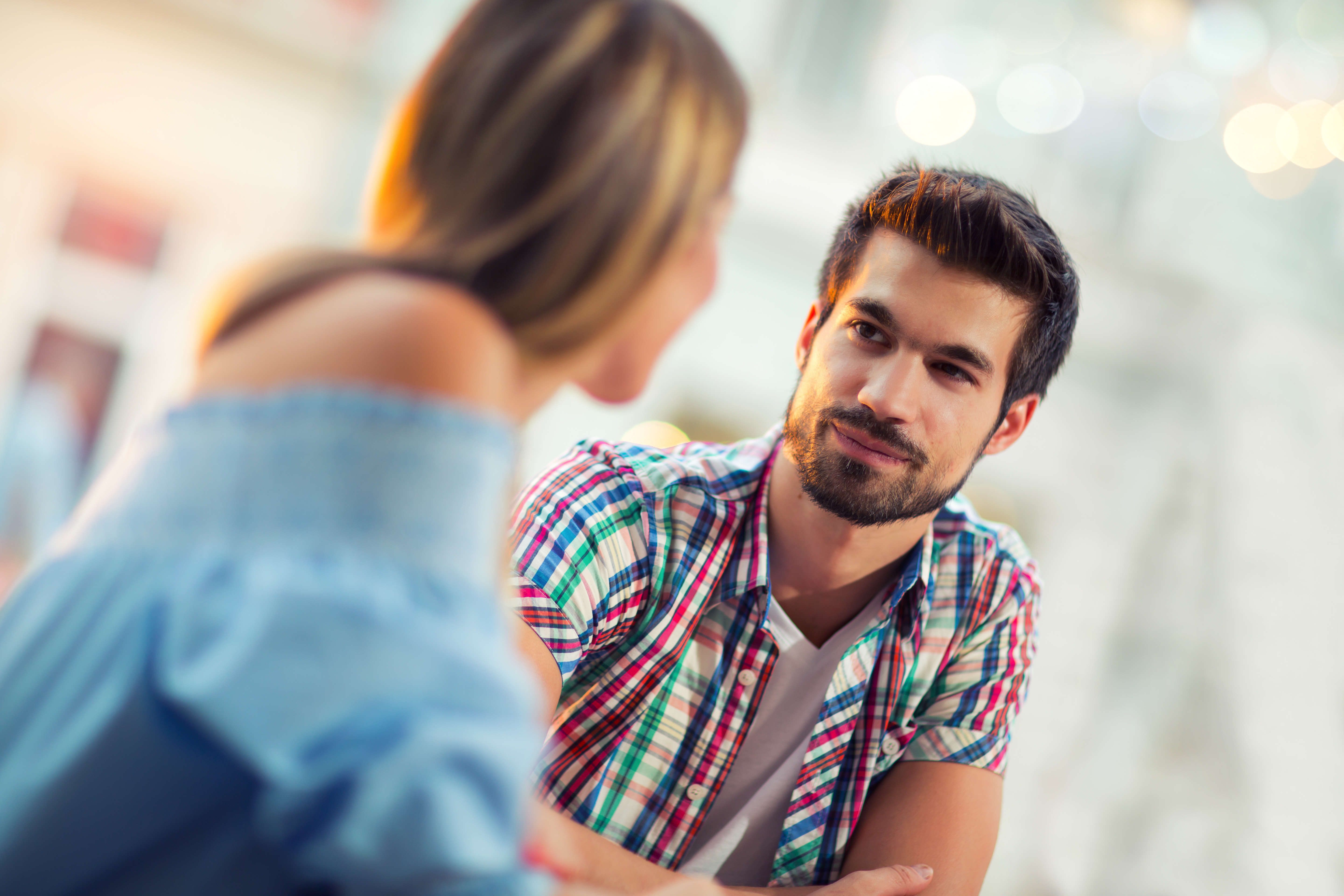 young couple in a deep conversation