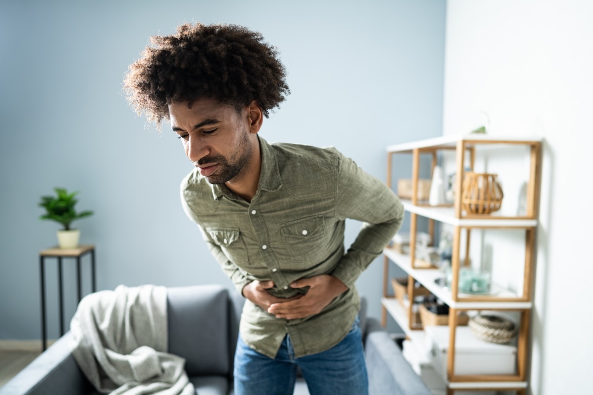 Man with stomach pain experiencing indigestion