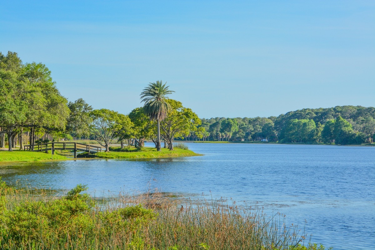 wooden bridge and lake at John S. Taylor Park in Largo, Florida