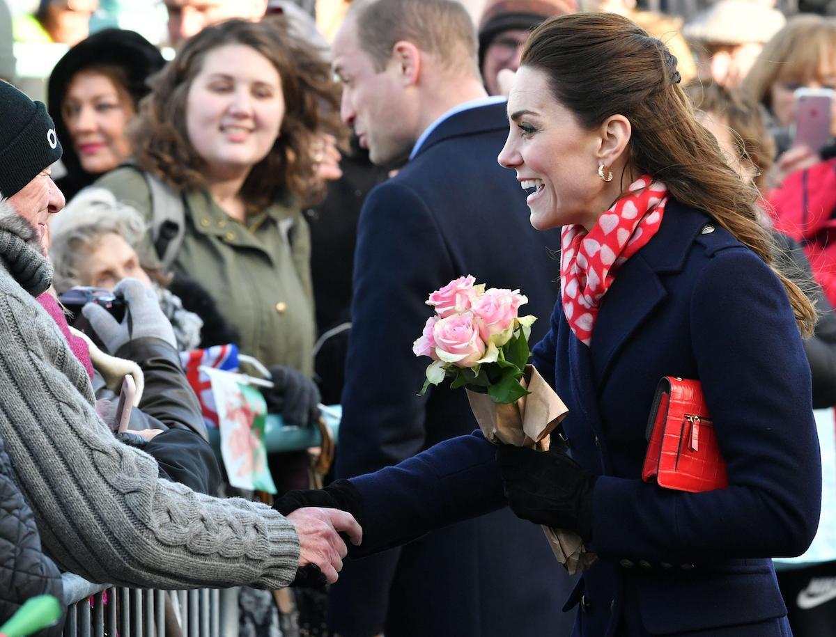 Kate Middleton, Duchess of Cambridge speaks to people in the crowd as she leaves the RNLI Mumbles Lifeboat Station, near Swansea in south Wales, Britain February 4, 2020.