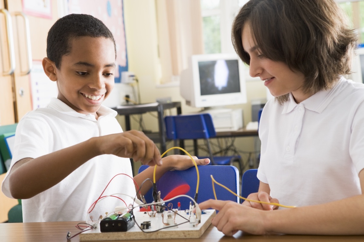 Students doing a project in school together