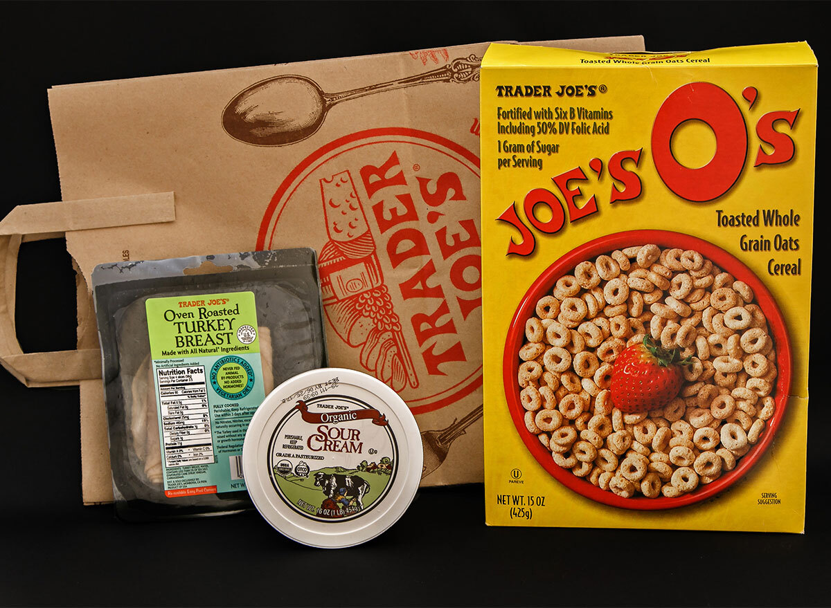 trader joes paper bag with box of cereal and turkey breast package