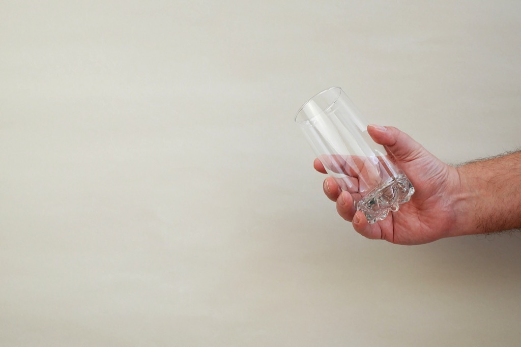 Man Holding Empty Glass Random Facts