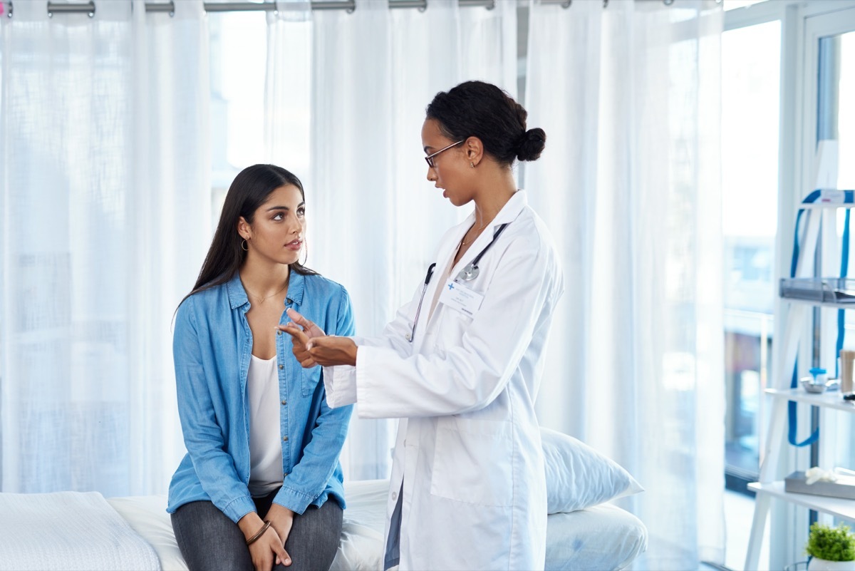 woman confused talking to her female doctor