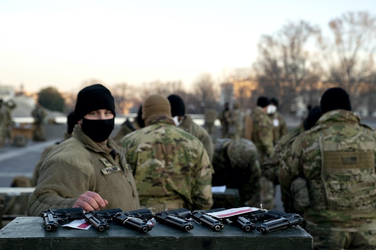 national guard members receiving handguns outdoors in d.c.