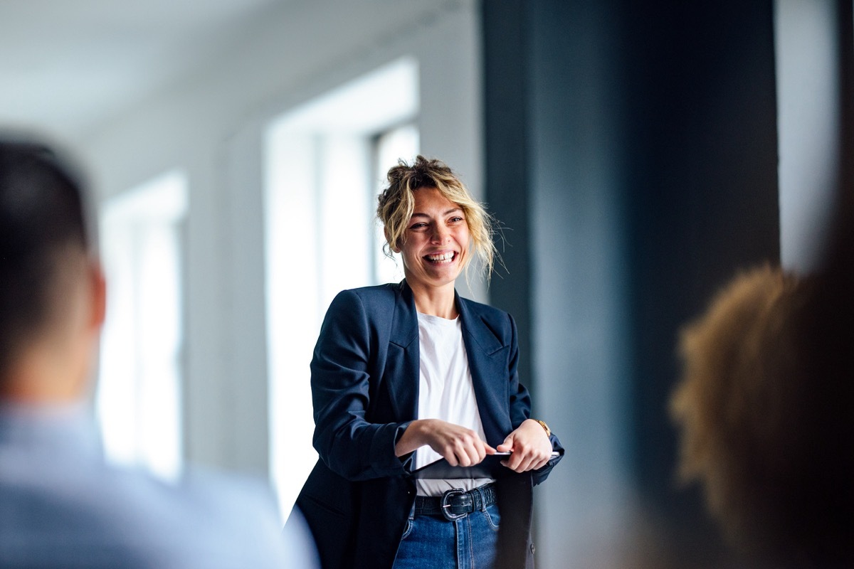 woman giving speech at the office