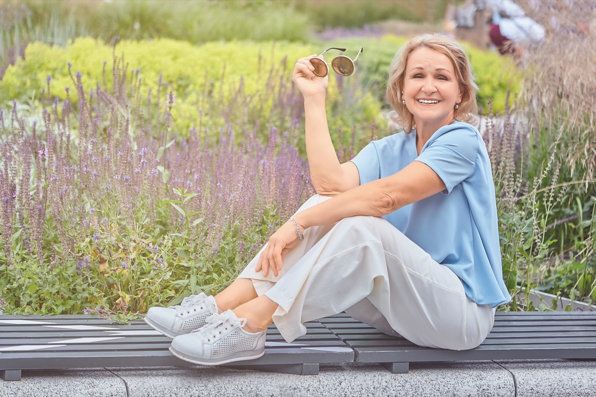 older woman wearing linen pants