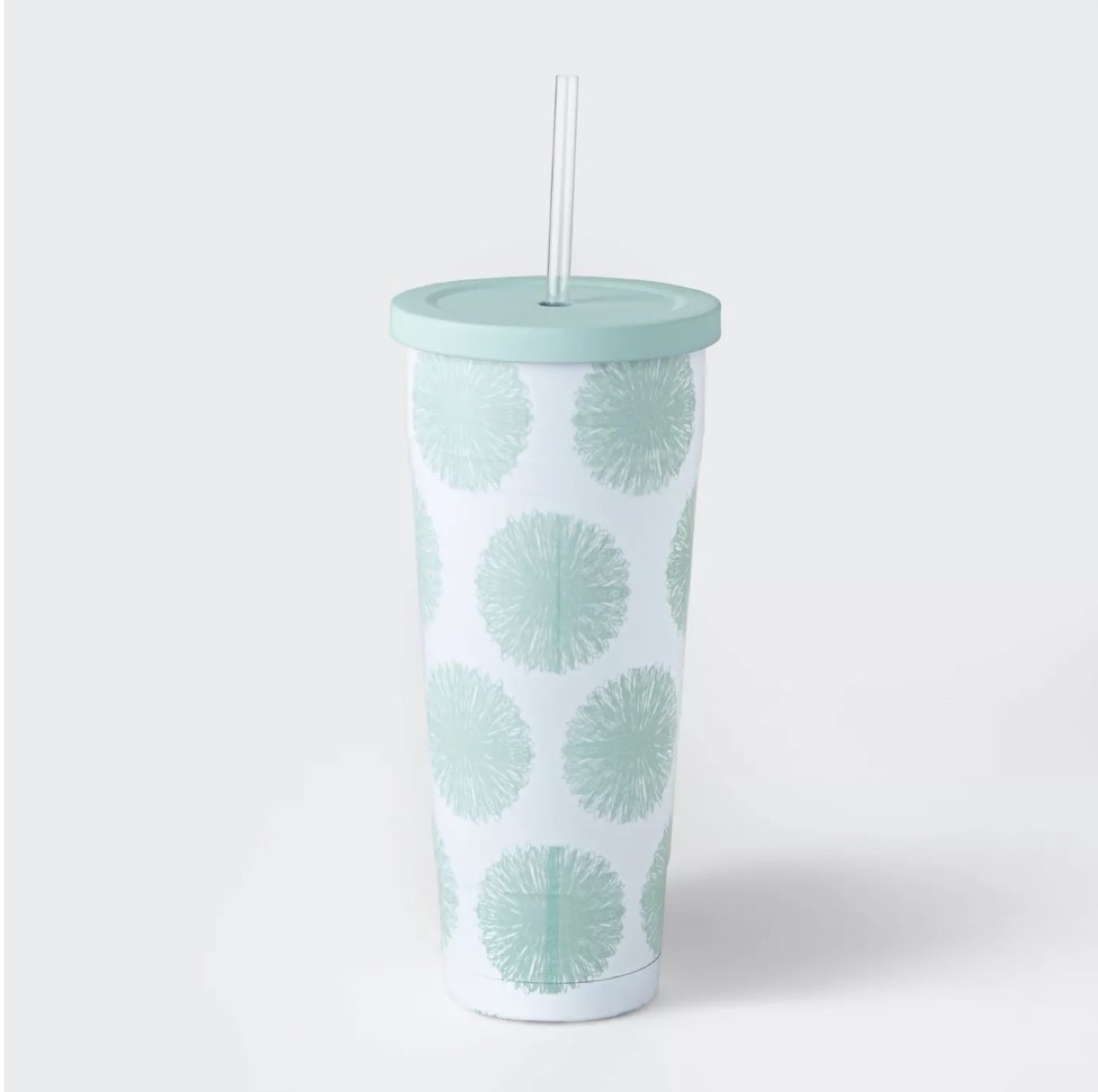 green and white straw tumbler