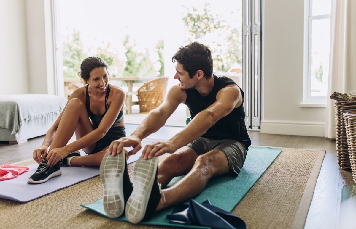 Two People Stretching